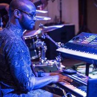 Playing Keyboard with "Soulosophy" show band at Chasers Night Club in Macon Ga.