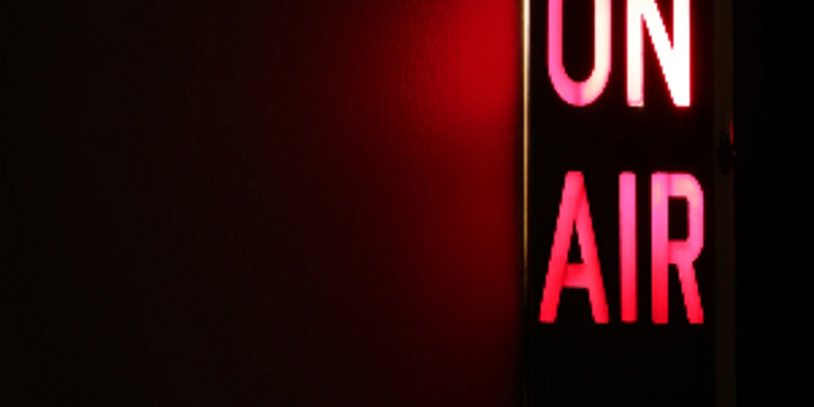 Photo of On Air sign outside a radio or television studio