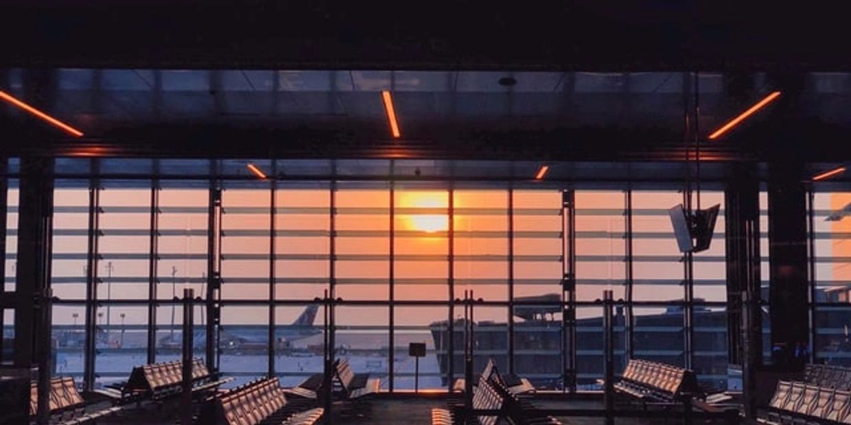 An airport at sunset