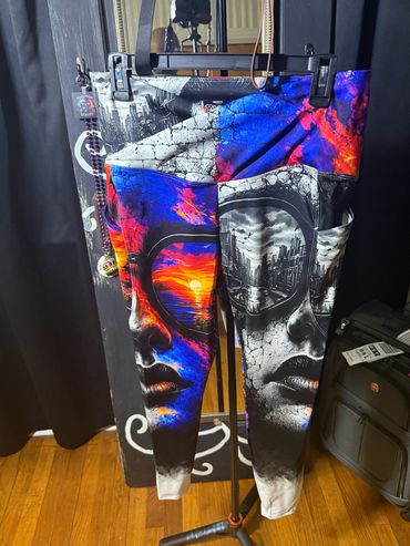 Colorful leggings with face and cityscape design.
