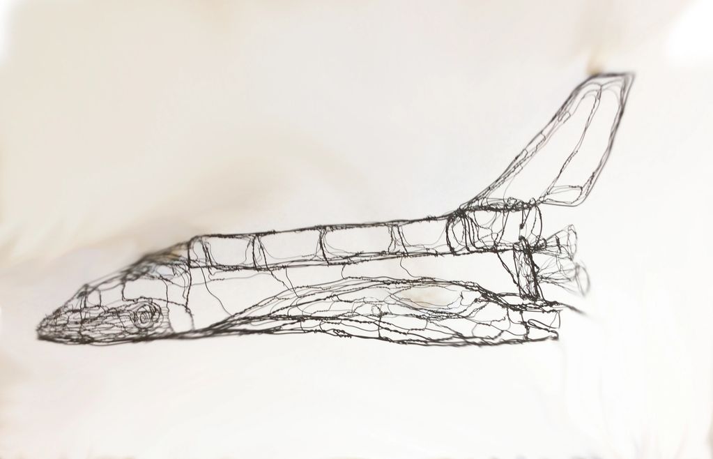 Side view, 3D wire sculpture of Challenger space shuttle