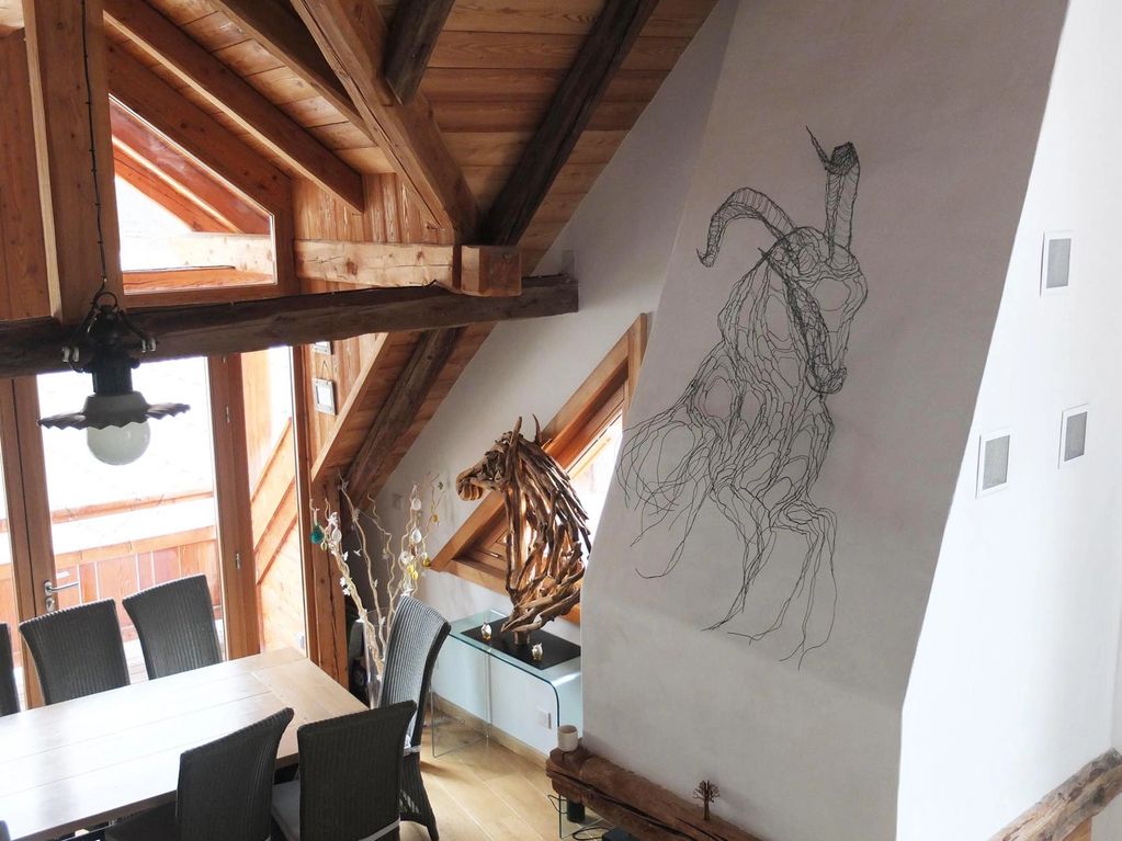Ibex wire sculpture, installed on chalet wall in the French Alps.