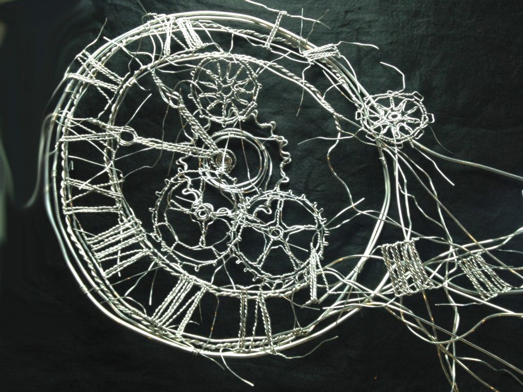 Detail, work in progress "Tempus Fugit" (Time Flies) 24" x 96" wire sculpture wall art clock
