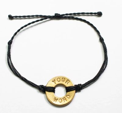 Metal stamped word on cord bracelet
