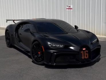 black bugatti infront of shop with paint protection film installed in west valley city utah