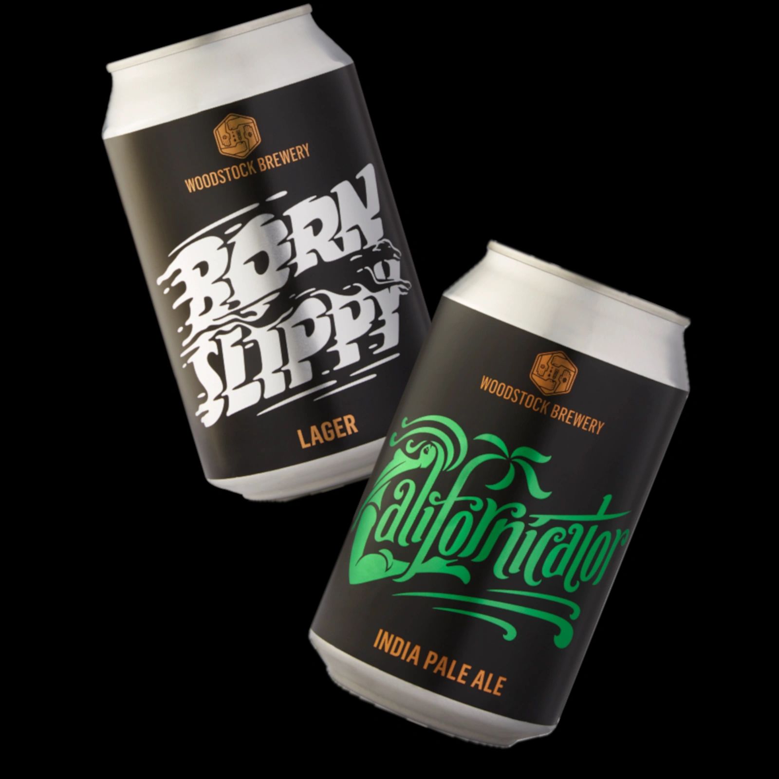 Two Woodstock Brewery beer cans, Born Slippy lager and Californicator IPA, against black background.