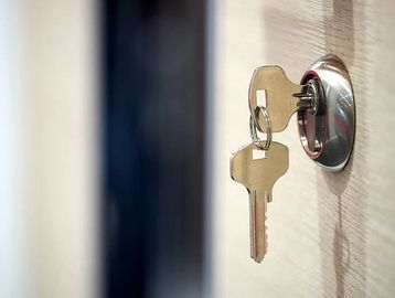new house keys in a lock after a rekey