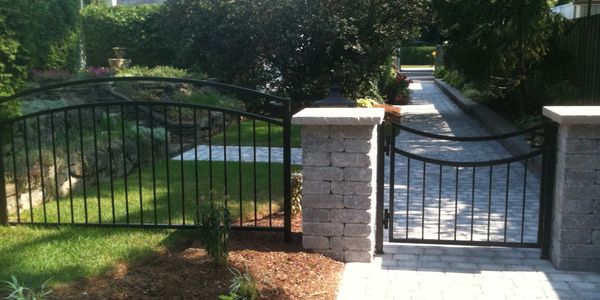 Even a simple gate and fence can elegantly express contour and shape