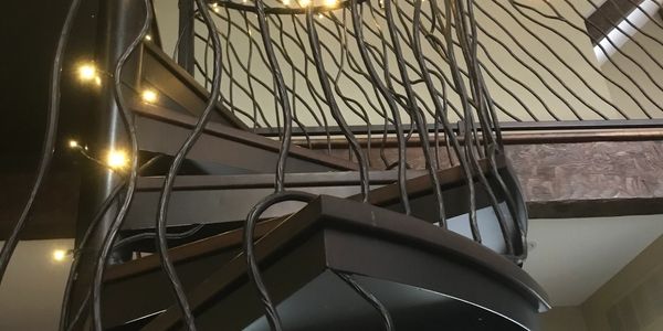 Custom Metal Spiral Stairs Artisanal Natural "Growing" Vine theme