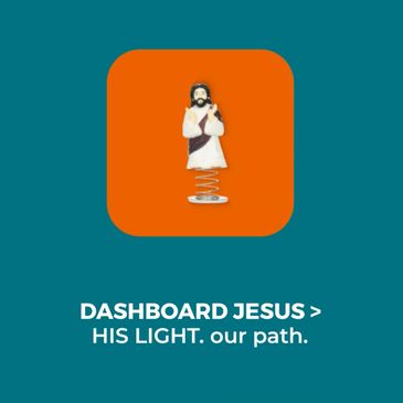 Dashboard Jesus bobblehead with the phrase 'HIS LIGHT. our path.'