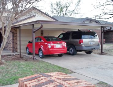 20ft/20ft Flat-pan aluminum carport that is two toned in color with larger 10" cross beams Moore, OK