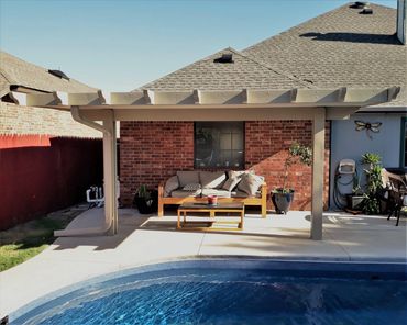 Sip Patio Cover with the Santa-Fe trim package installed by the pool