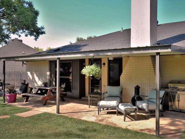 28ft x 10ft attached galvanized steel framed patio cover with 26ga steel cover and bent formed trim