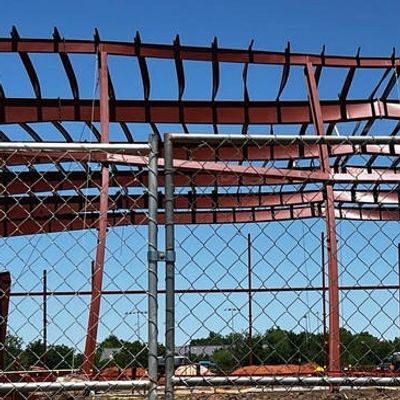 Wind damaged structural steel building during construction.