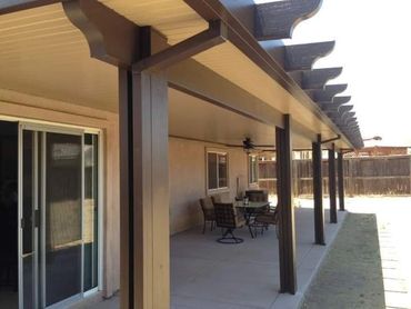 Attached structual insulated panel patio cover with out Santa-Fe trim package trim