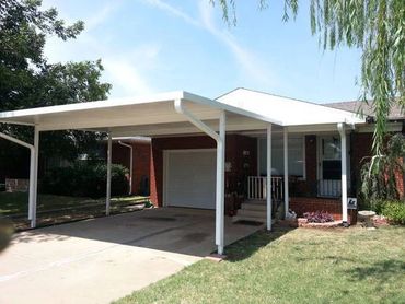 30ftx20ft attached structural insulated panel (SIP) carport and dog leg porch cover. OKC