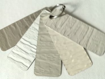 Color samples of the new Monterey trim packages with the deeper embossed wood grain.