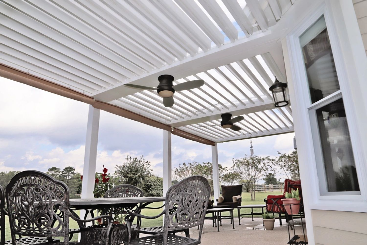 Movable slat patio cover that allows you to be in charge. You can open it up or close it as needed.