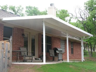 Attached 24ft wide x 14ft 3" SIP panel patio cover in standard E trim with backset poles and beam