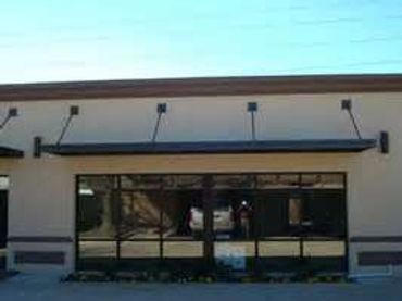 Window, door or sidewalk awning flat pan aluminum awnings to protect the store front.