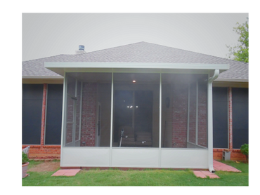Screen room edition with structural insulated panel roof and 20-inch-high knee wall and man door.