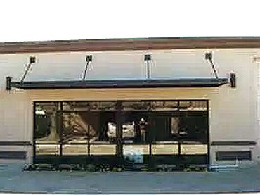 Window, door or sidewalk awning flat pan aluminum awnings to protect the store front.
