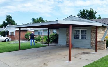 20ft X 20ft attached 6" structured red steel with larger 4inch squire poles 26ga steel top side trim