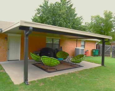 20ftx14ft attached flat-pan aluminum patio cover with oversized extruded aluminum header and poles.