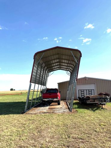 Wind damaged light weigh RV carport that the gussets were broken, and the frame was bent