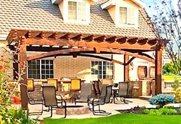 Stand-a-lone high quality timber framed pergola with built-in electrical with ceiling fan cedar.