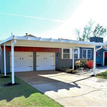 20ftx20ft attached rolled formed 26ga Steel flat-pan carport with Santa-fe trim panckage attached