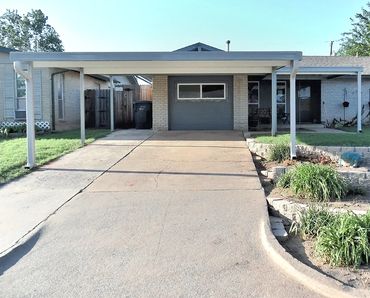 Attached 20ft x 20ft galvinized structured steel carport and connected 15ftx10ft front patio cover
