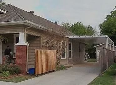 Lean-too attached 35ft long x 14 ft aluminum cladded SIP carport with the Santa-Fe trim,