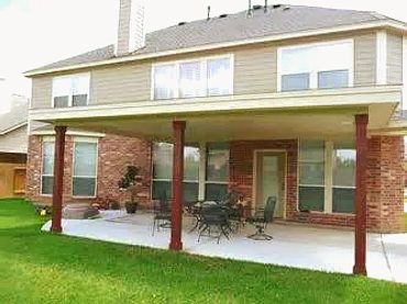 Attached structural insulated panel patio cover with wooden 6x6 cedar poles