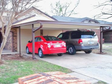20ftx20ft attached flat-pan aluminum carport with 10-inch cross beams built in Moore, OK Brown/Ivory