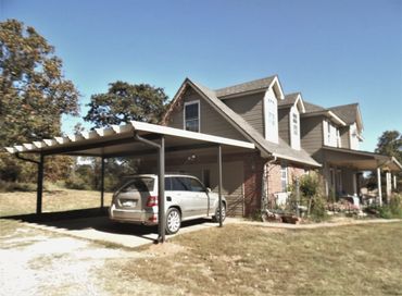 20ft X 20ft attached rolled formed aluminum carport with a Santa-Fe (Alumawood) package Clay/Bronze