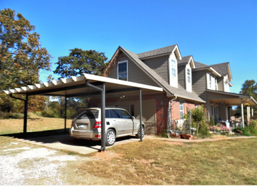 20ftX20ft attached aluminum flat-pan carport with the Santa-Fe term. Clay/Bronze color. Norman, OK