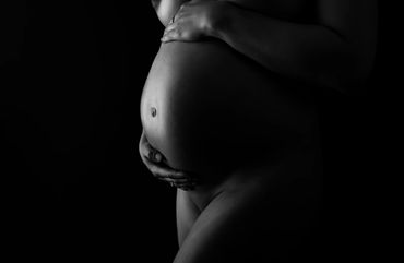 Close-up bodyscape with dramatic shadows and highlights