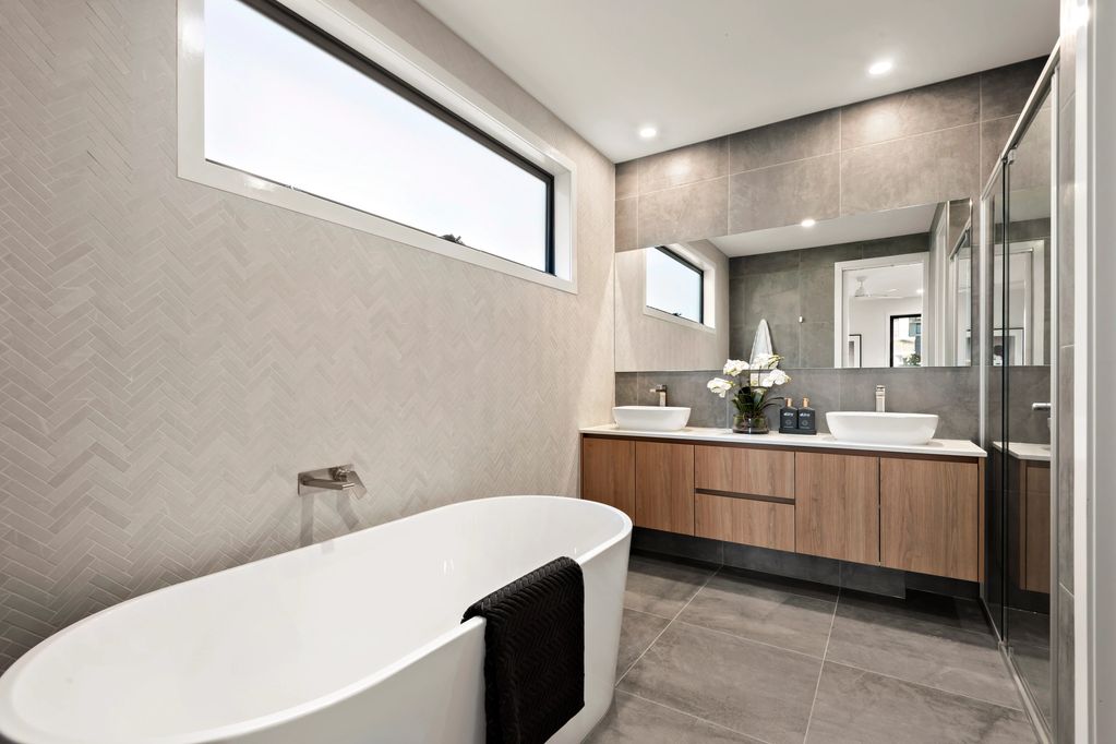Utilising a small space to provide a warm and functional experience in the bathroom