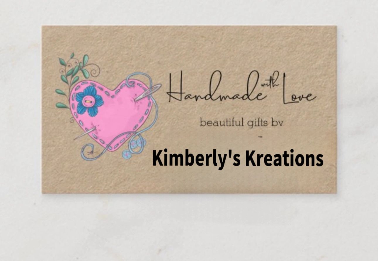 A craft business card with a pink heart and needle design.