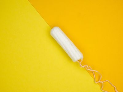 A tampon on a yellow background.
Photo by Reproductive Health Supplies Coalition on Unsplash