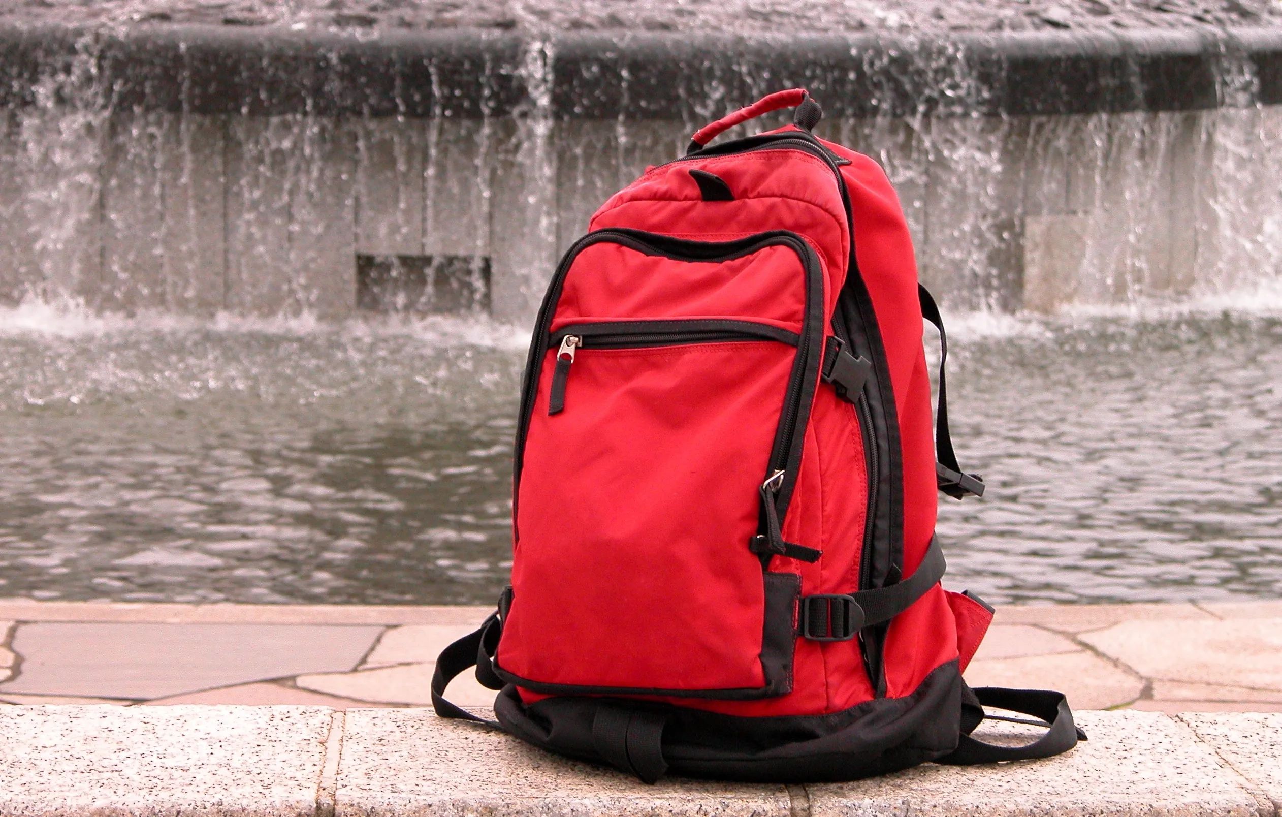 Red backpack for everyday use.