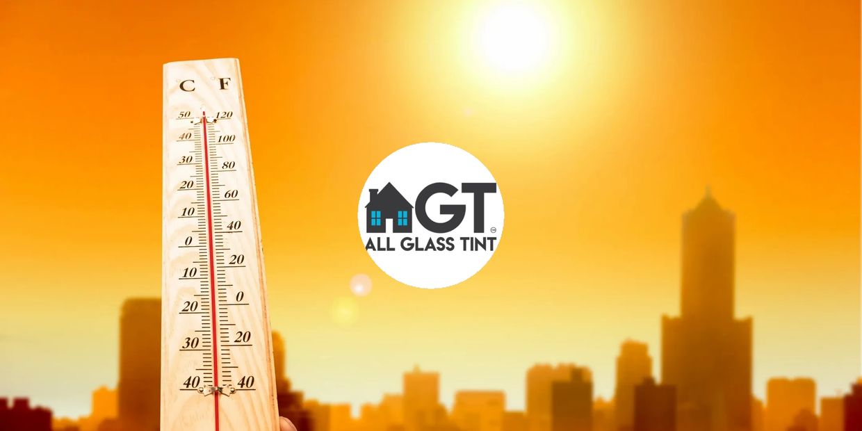 hot sunny day with city skyline and thermometer 
