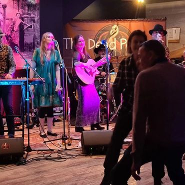 People dancing to a band