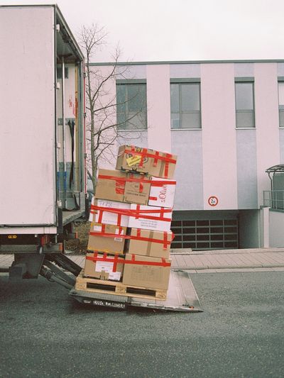 Image of a pallet of moving boxes being efficiently unloaded by River City Moving professionals.