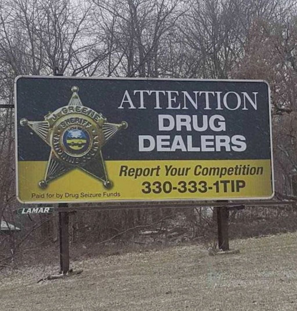 An image of a post and panel sign installed