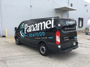 a picture of a van which has been lettered in vinyl 