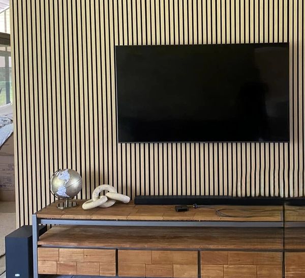 Image Description:
TV wall mounted on a custom timber feature wall in Brisbane