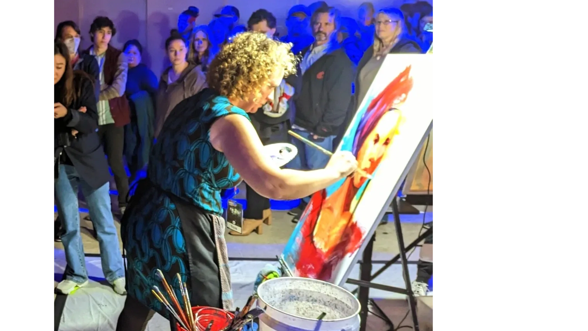 2-time Northwest regional Art Battle champion Frida Haas paints live in front of an audience