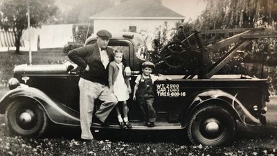 Founder, Lee Wilcox, with his first tow truck